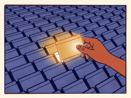 Main insérant carte lumineuse dans surface bleue